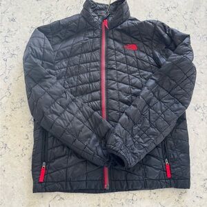 The North Face Black Quilted Jacket with Red Zippers